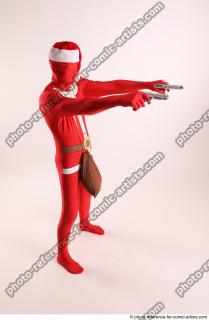 JOEL_ADAMSON CHRISTMAS VILLAIN WITH TWO GUNS